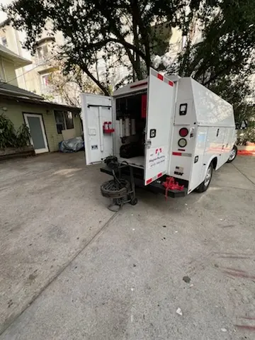 Magnet Plumbing service vehicle on-site for Grease Trap Cleaning in Fort Pierce North
